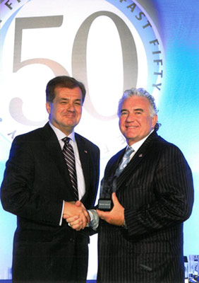 John Clark of The Whitestone Group Accepts the Business First Fast 50 Award